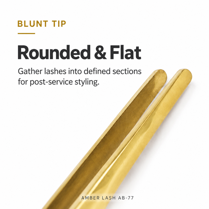 Close-up of the rounded, flat gold tips of Amber Lash AB-77 lash styling tweezers.