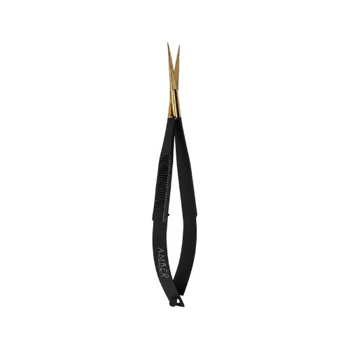Amber Lash One Cut Precision Lash Scissors displayed on a soft pastel geometric background