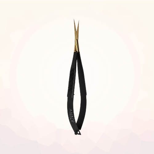 Amber Lash One Cut Precision Lash Scissors with gold blades and matte black handle on white background
