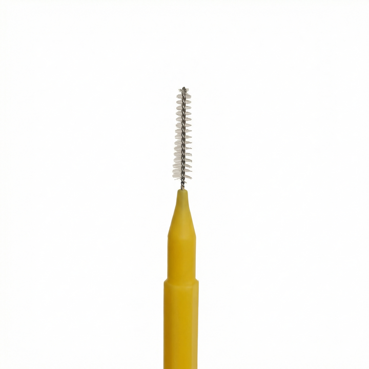 Mini brow spoolie brush with cap for separating lashes without clumping