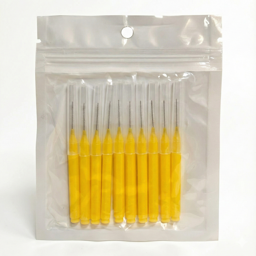 Travel-friendly micro eyebrow spoolie with hygienic protective cap
