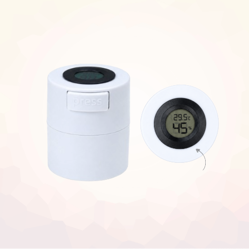 White lash glue storage container with a lid display close-up showing 29.5°C and 45% humidity.