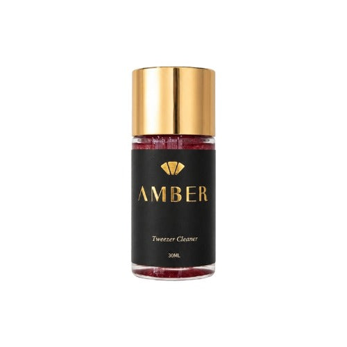 Amber Lash 30 mL tweezer cleaner bottle with a gold cap and black label on a white background.
