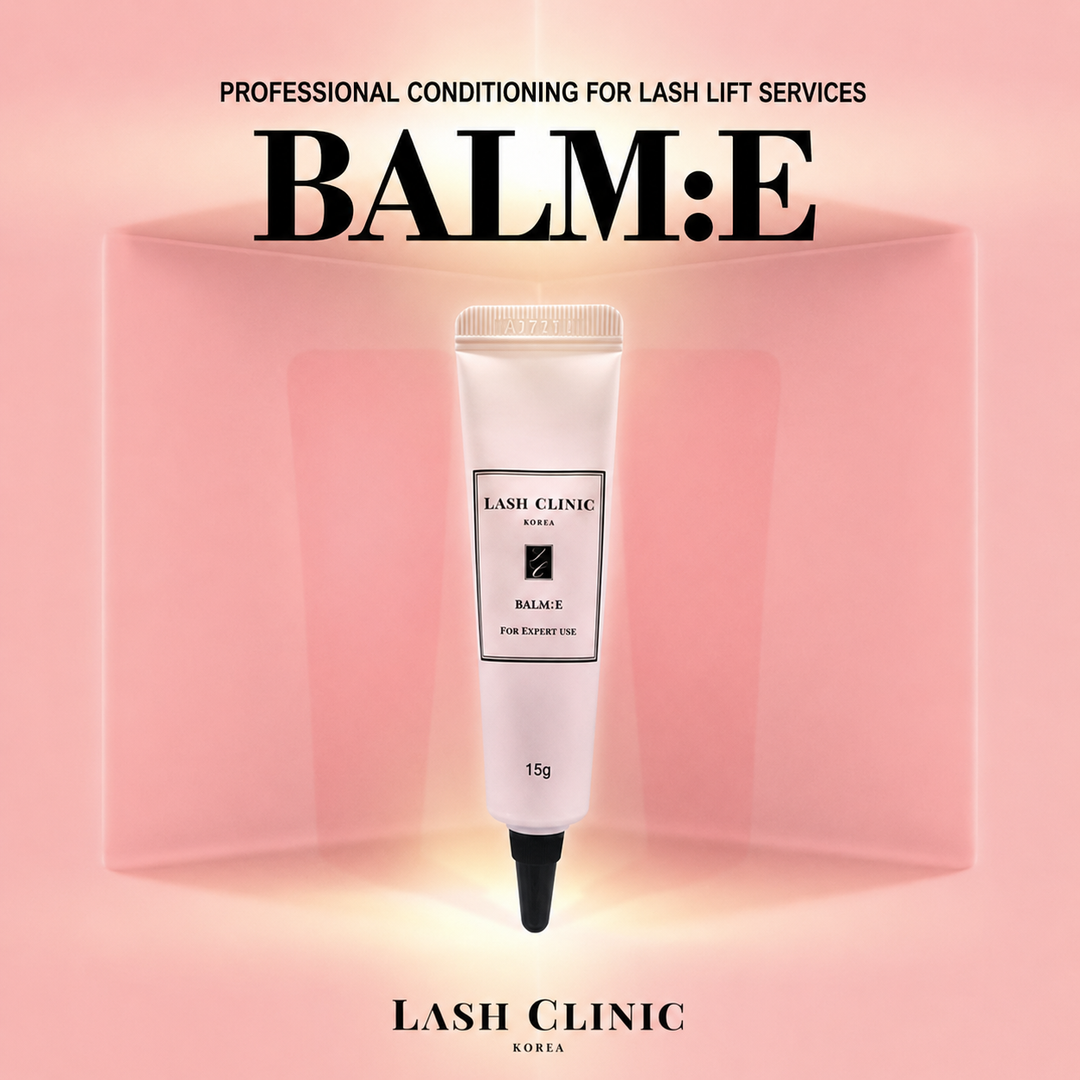 Lash Clinic BALM:E 15 g conditioning balm tube for professional lash lift services on a pink background.