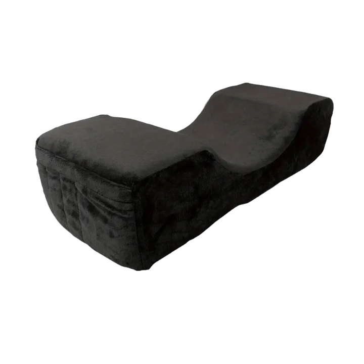 U-shaped memory foam lash extension pillow with velvet cover and side tool pockets