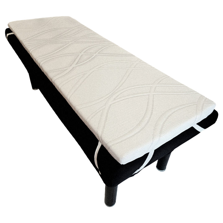 Amber Lash memory foam lash bed topper on beauty salon bed